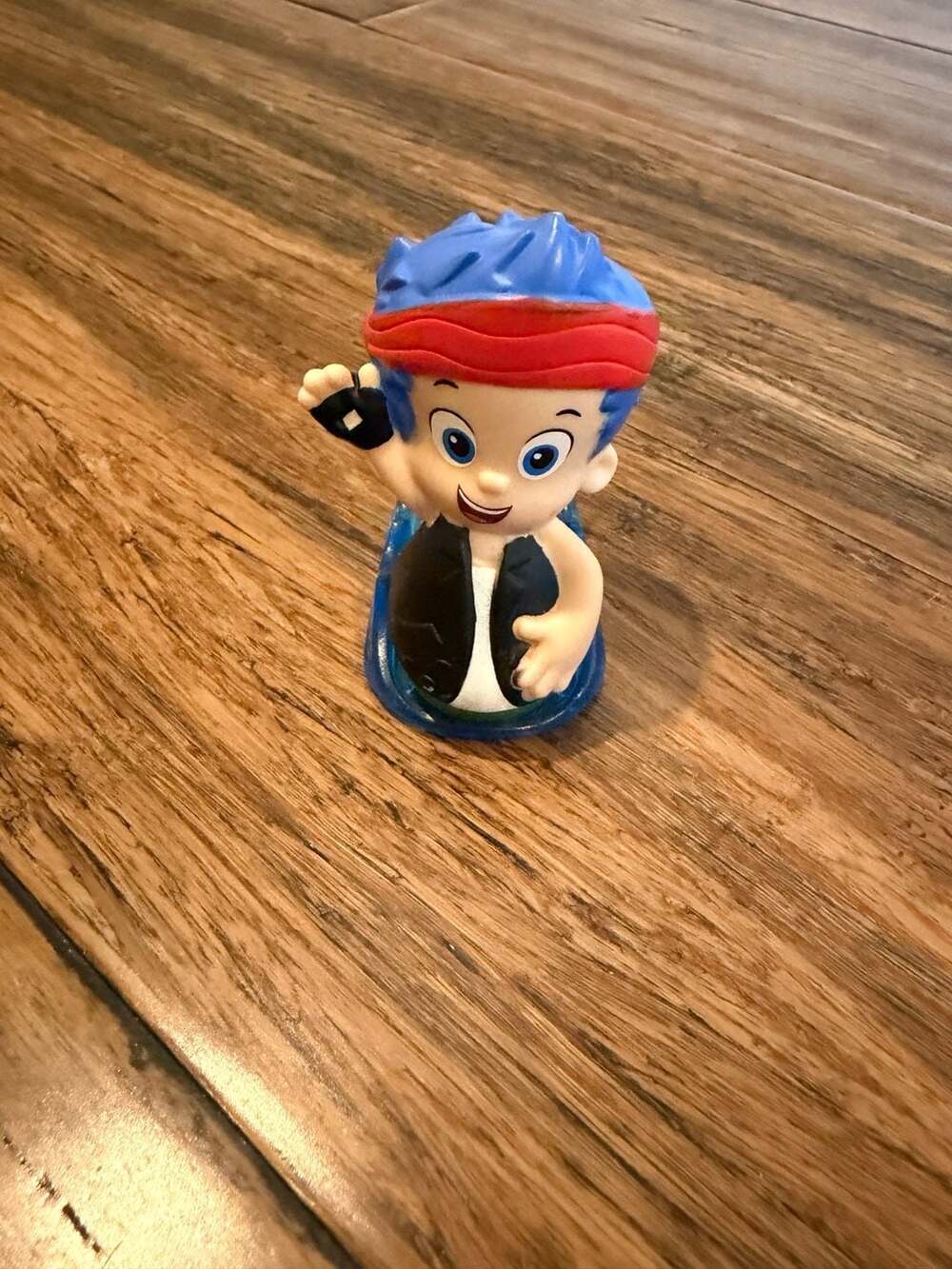 Fisher-Price Bubble Guppies Gil Rock and Roll Slider Figure